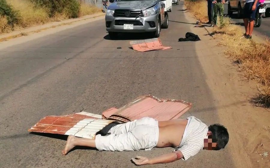 Persona atropellada sobre carretera