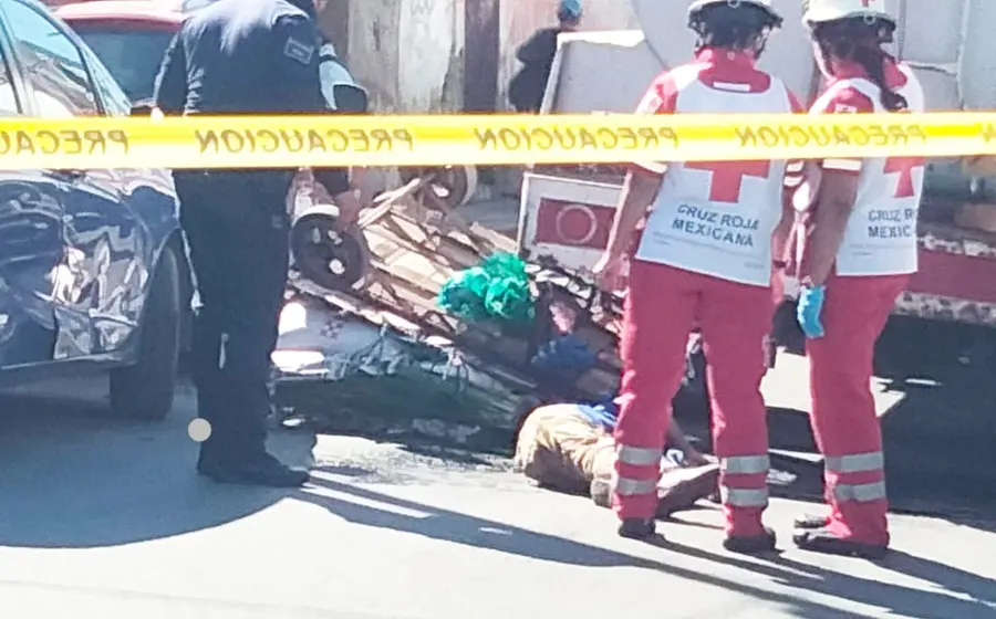 Cuerpo médico y área acordonada