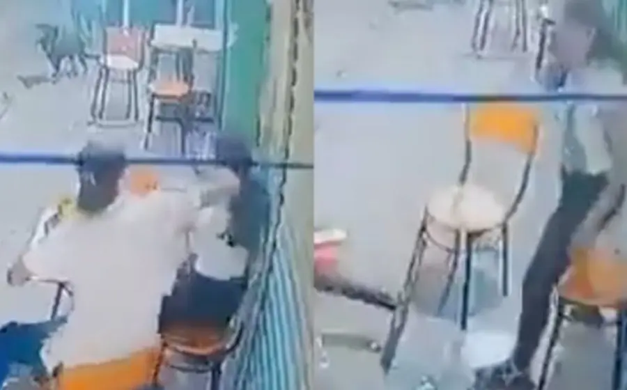 Cámaras de seguridad captaron la acción en donde se ve a la pareja sentada afuera de un pequeño restaurante.