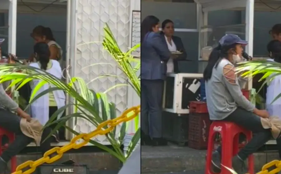 Cantante callejera en puesto de tacos