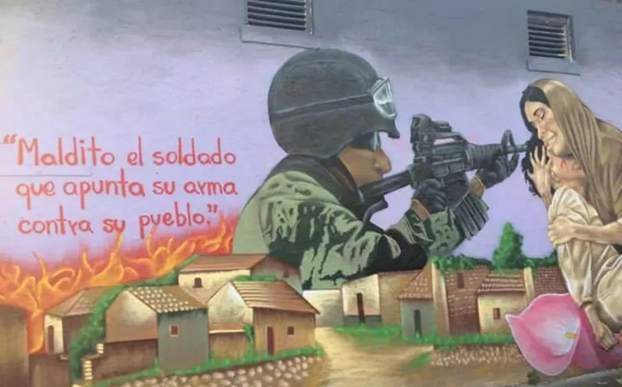 Mural con protesta a soldados