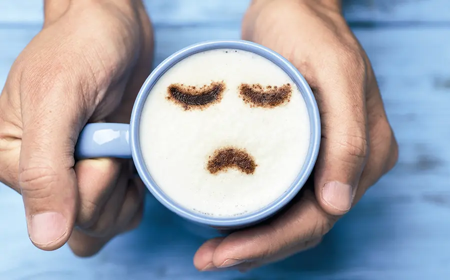 taza-de-cafe-con-cara-triste