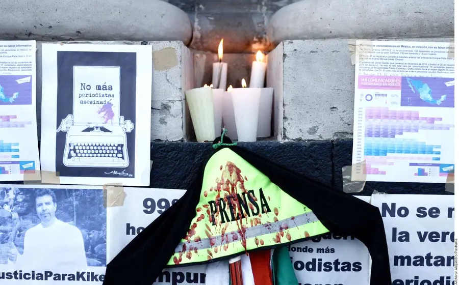 veladoras-prensa 