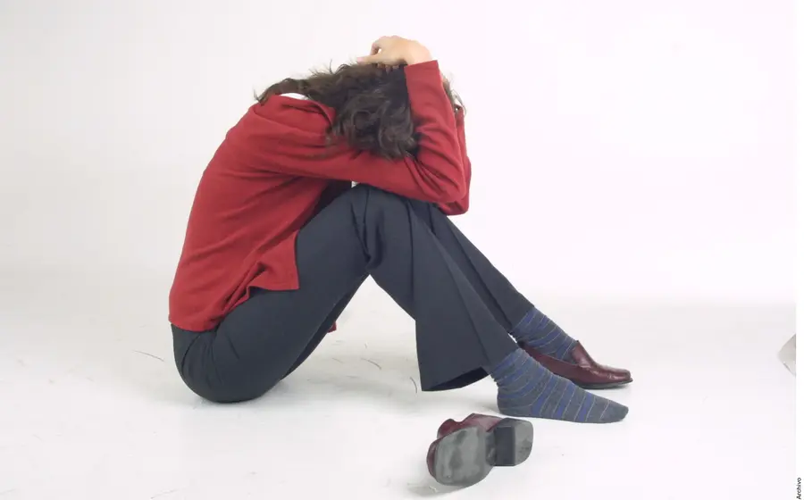 mujer_protegiéndose