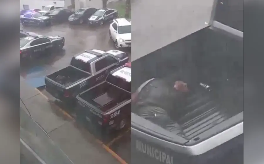 detenido_bajo_lluvia_patrulla