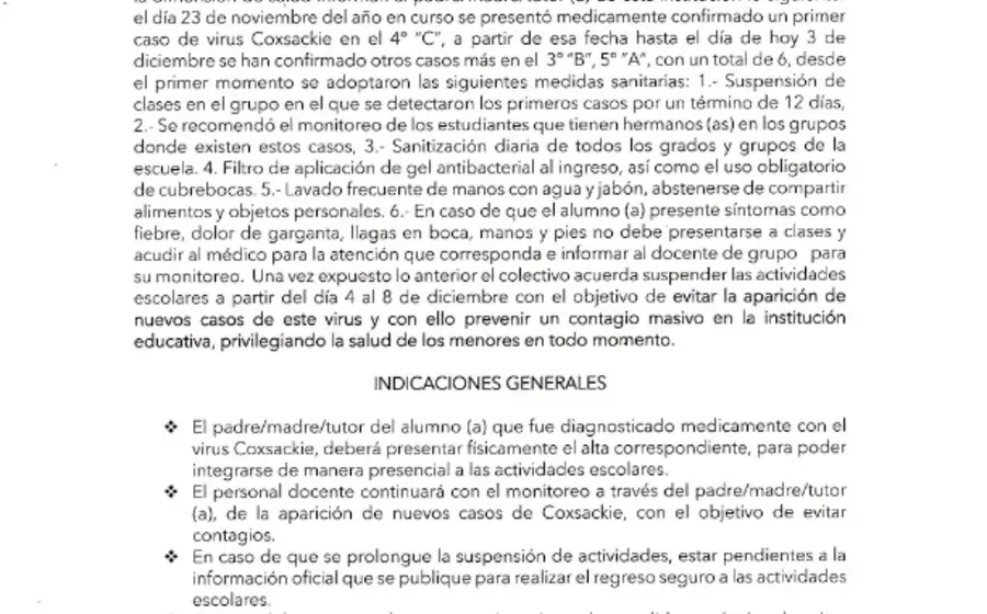 Fotografía del comunicado oficial que informa sobre la suspensión de clases en una primaria de Xoxo por un brote del virus Coxsackie.
