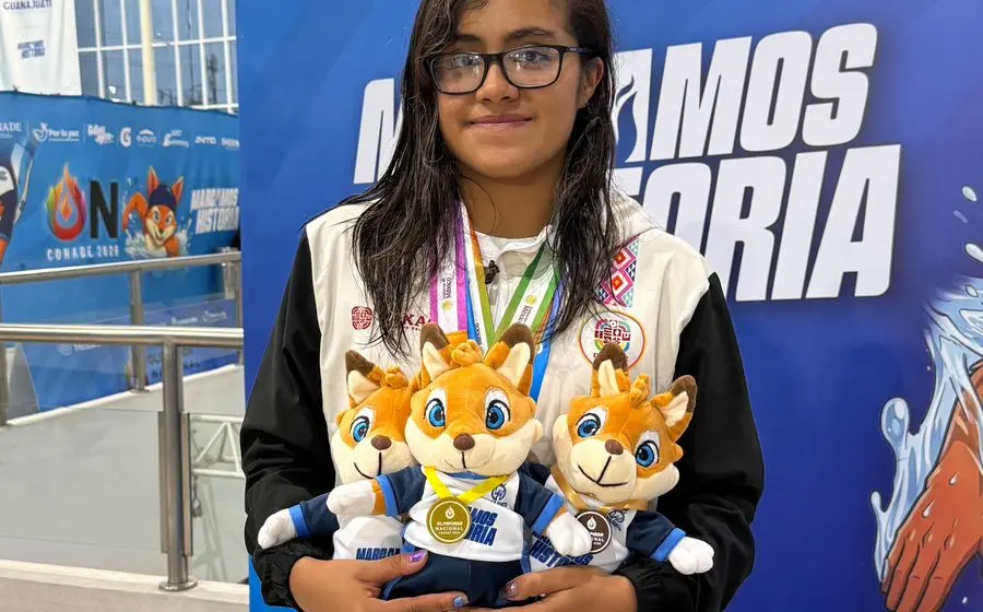La atleta Sahara Monroy celebra su victoria al conquistar la anhelada medalla de oro en el último día de la competencia.