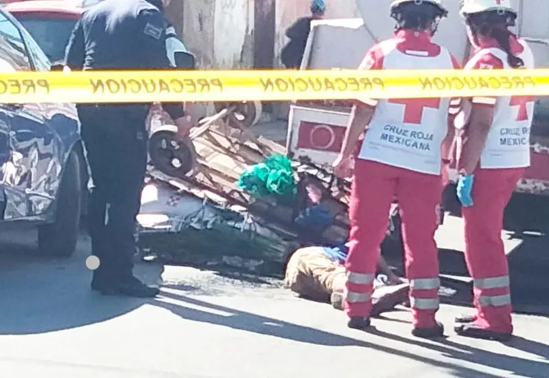Cuerpo médico y área acordonada