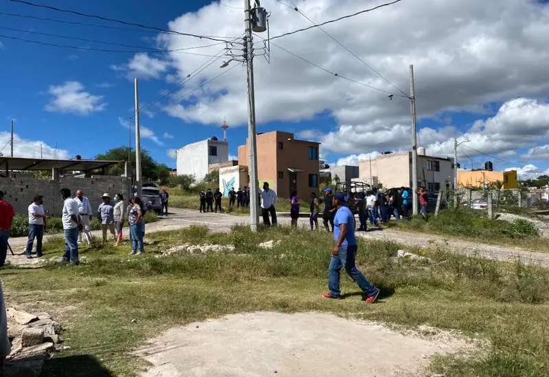 Personas en terreno de Huajuapan