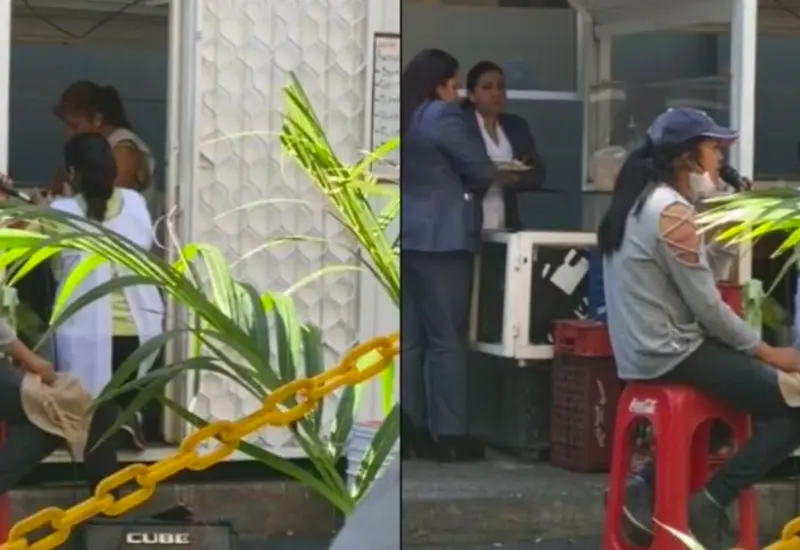 Cantante callejera en puesto de tacos