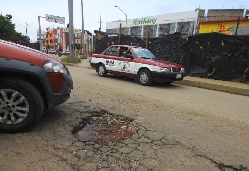 Calle con baches