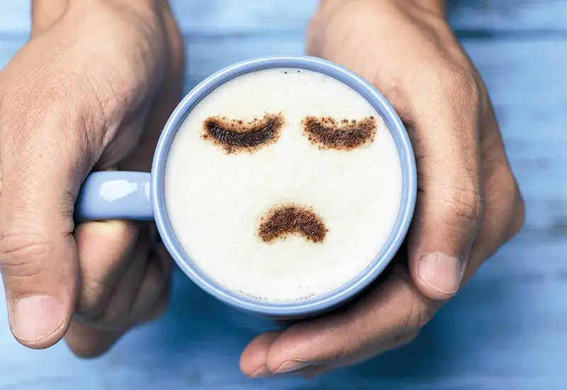 taza-de-cafe-con-cara-triste