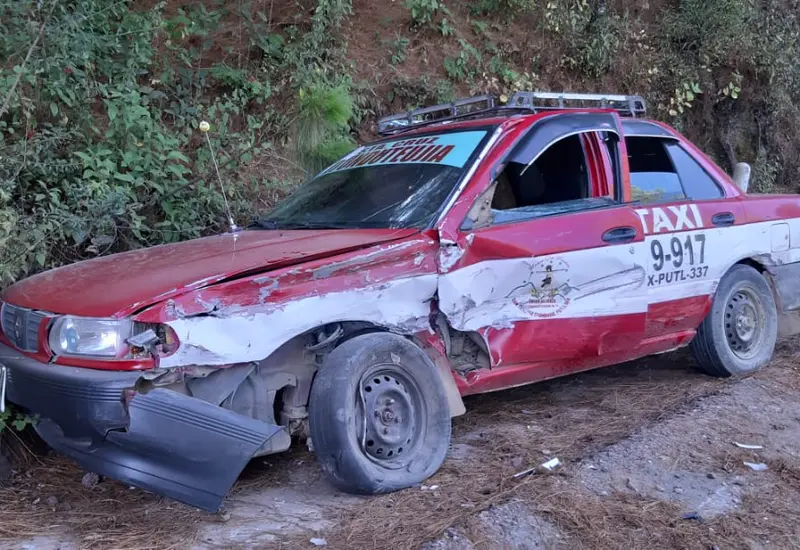 Taxi dañado.
