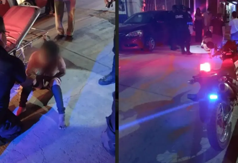 mujer-auxiliada-tras-accidente-moto