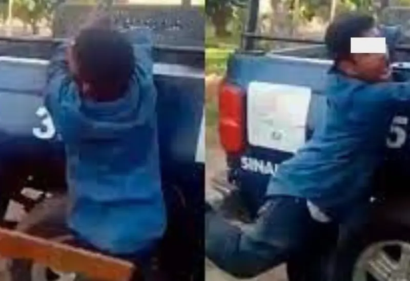 policia_golpea_con_tabla_detenido