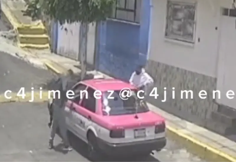 taxista_evita_asalto_arrastra_hampones