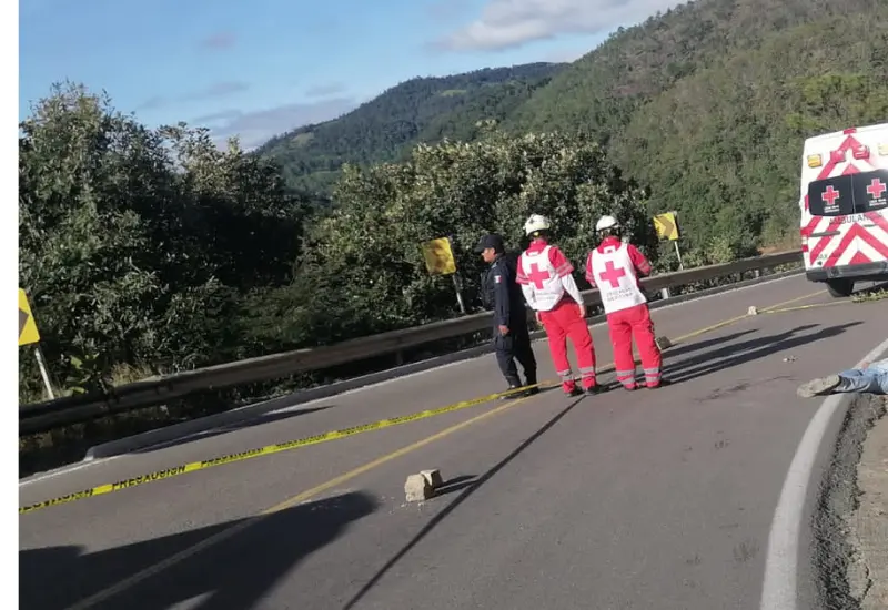 muerto-carretera-asaltado