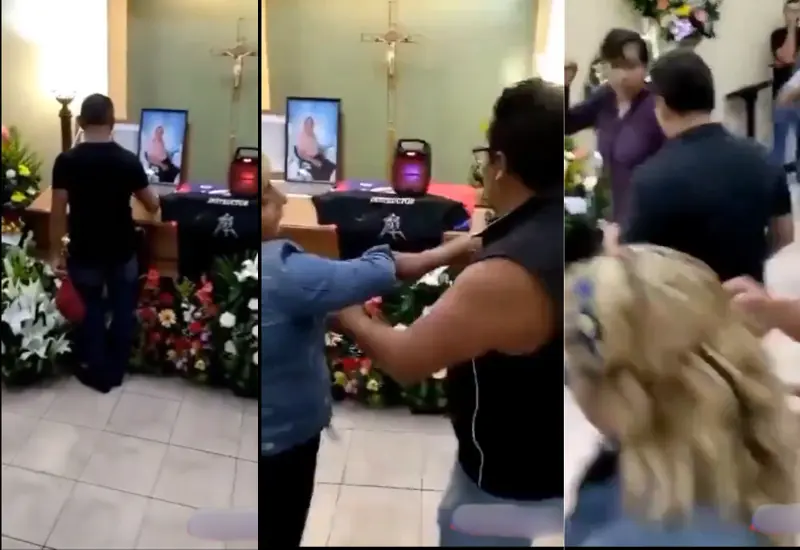 asistentes_bailan_velorio_caja_difunto