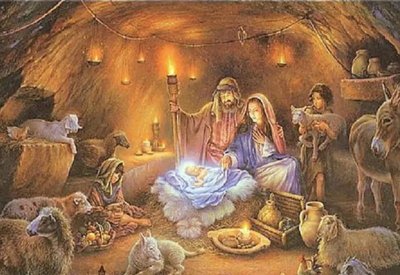 La figura del Niño Dios yace en un humilde pesebre, simbolizando su llegada al mundo y el nacimiento de Jesús.