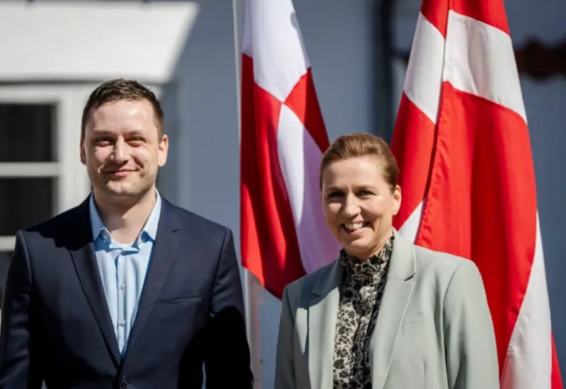 El primer ministro de Groenlandia y la primera ministra danesa en una reunión oficial, discutiendo sobre la soberanía y el derecho internacional.