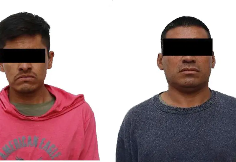 Los dos acusados, E.H.V. y D.C.G., tras ser vinculados a proceso por el delito de tentativa de robo con violencia.