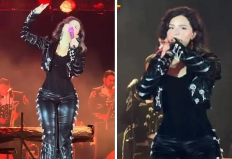 La cantante Ángela Aguilar sobre el escenario durante su presentación en Colombia, donde fue ovacionada por el público por su talento y figura estilizada.